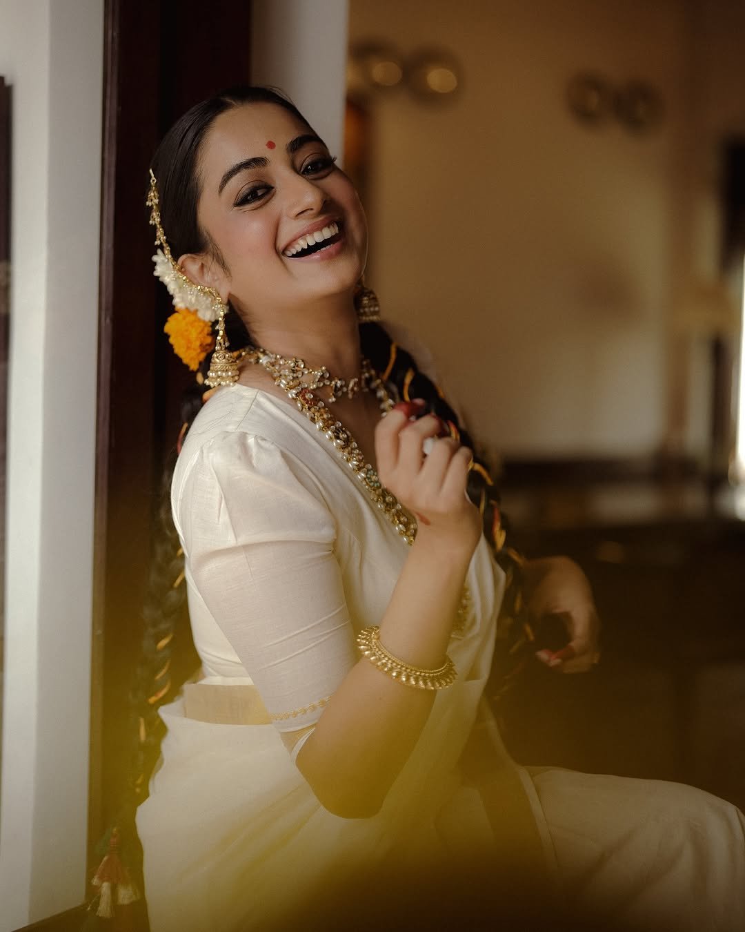 Namitha Pramod traditional braids jasmine gajra golden hour Photoshoot (12)