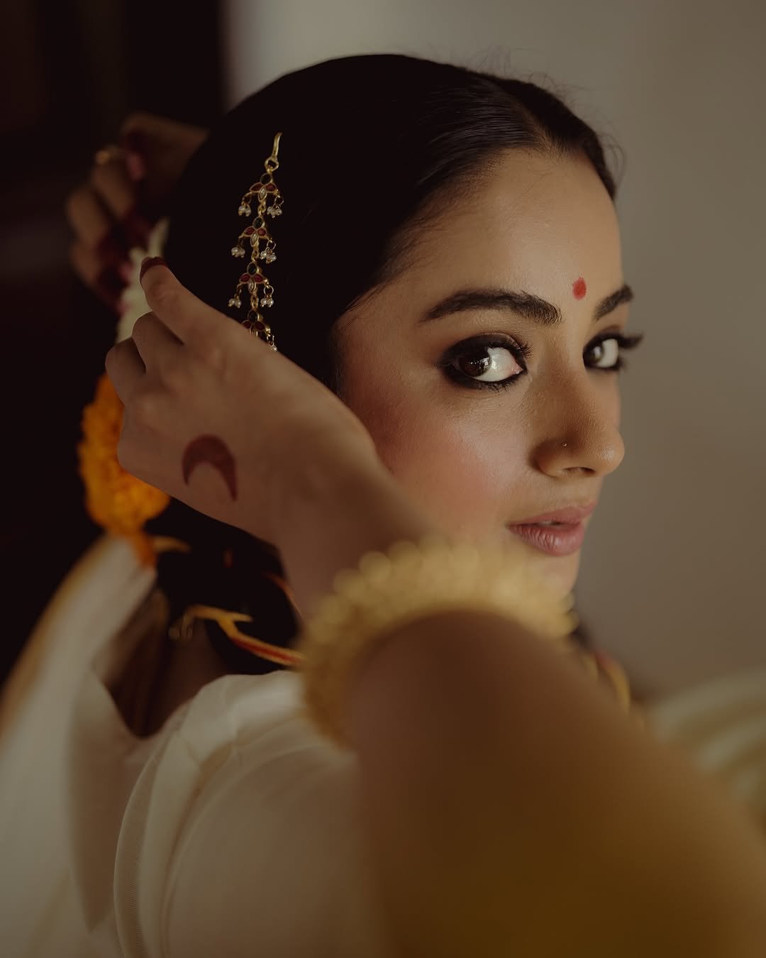 Namitha Pramod traditional braids jasmine gajra golden hour Photoshoot (15)