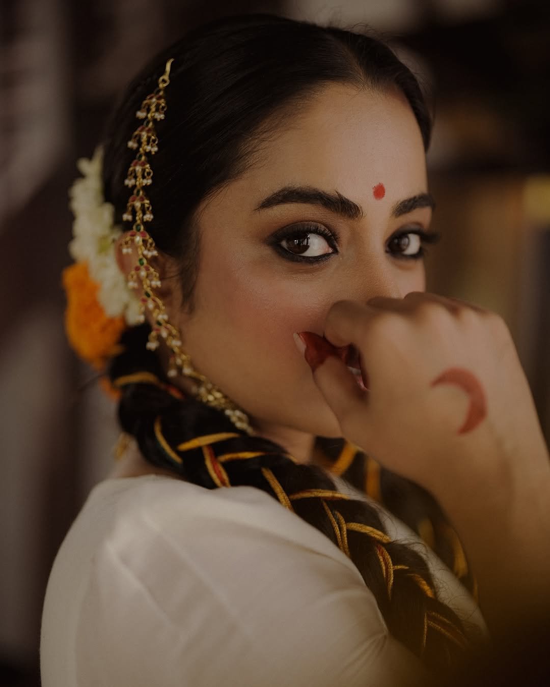 Namitha Pramod traditional braids jasmine gajra golden hour Photoshoot (16)