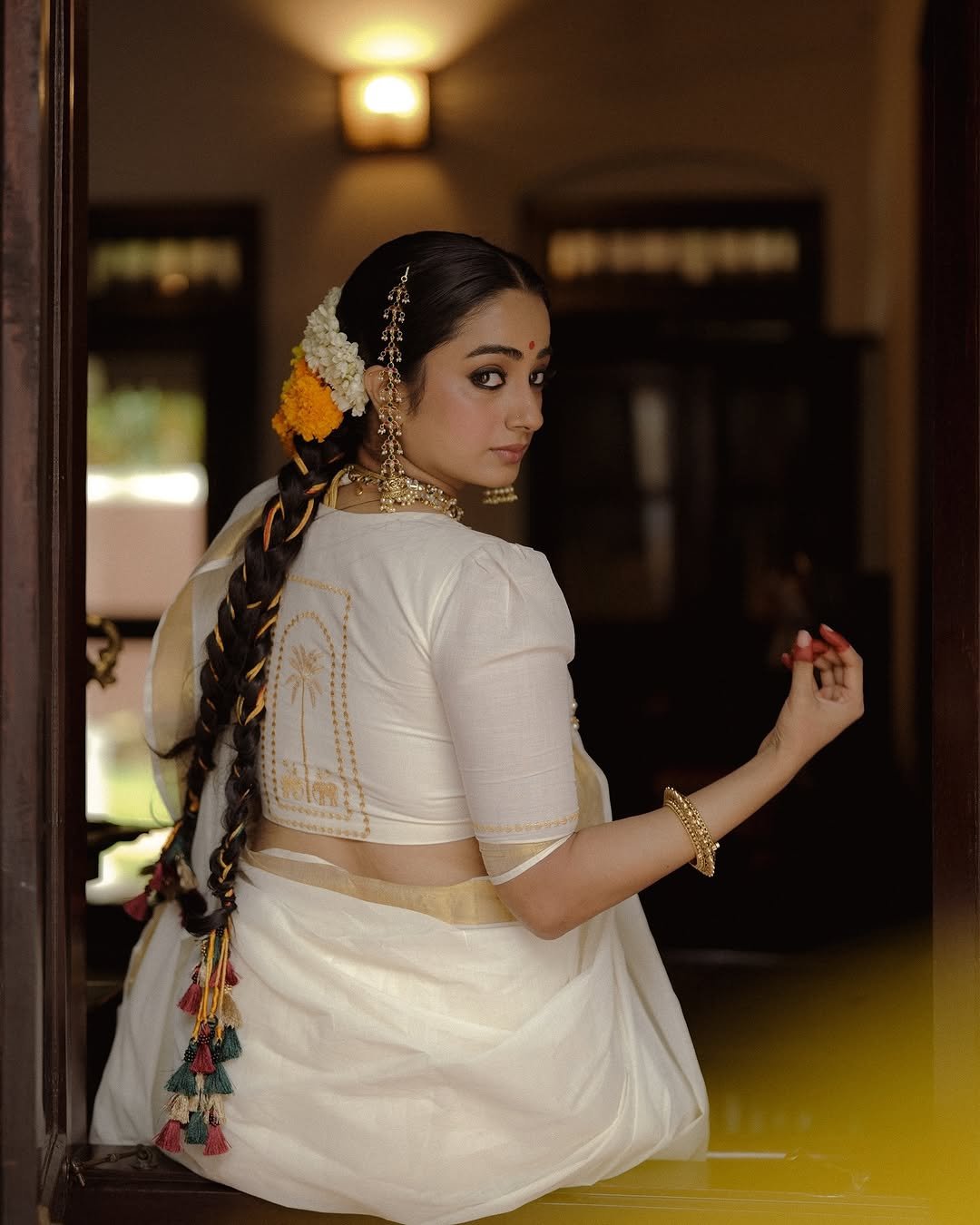 Namitha Pramod traditional braids jasmine gajra golden hour Photoshoot (17)