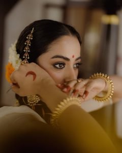 Namitha Pramod traditional long braids with fresh jasmine gajra flowers