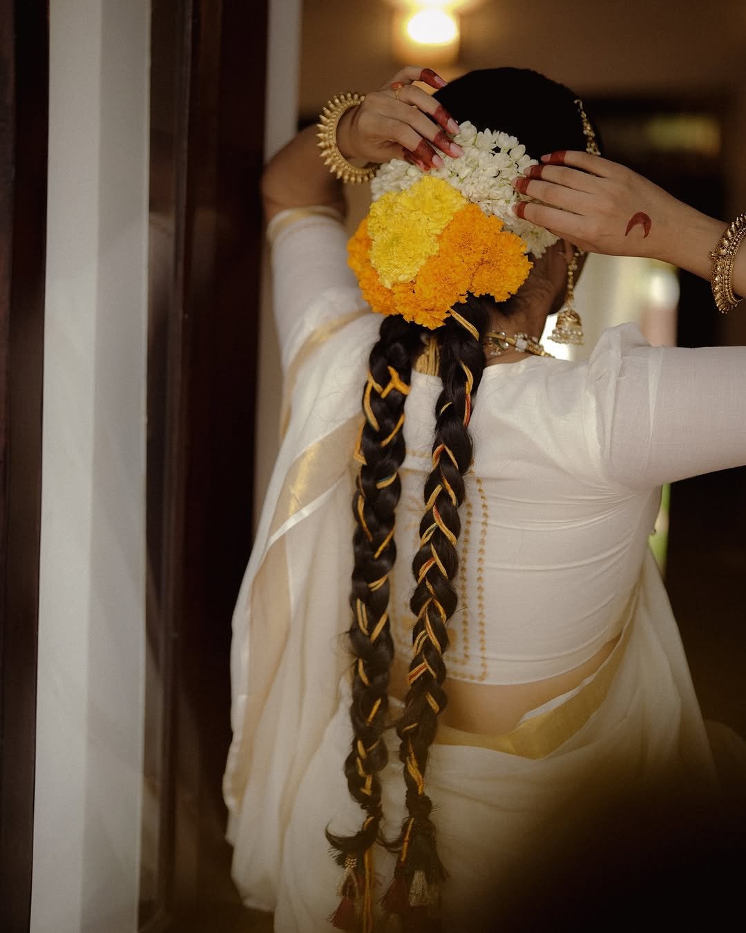 Namitha Pramod traditional braids jasmine gajra golden hour Photoshoot (4)