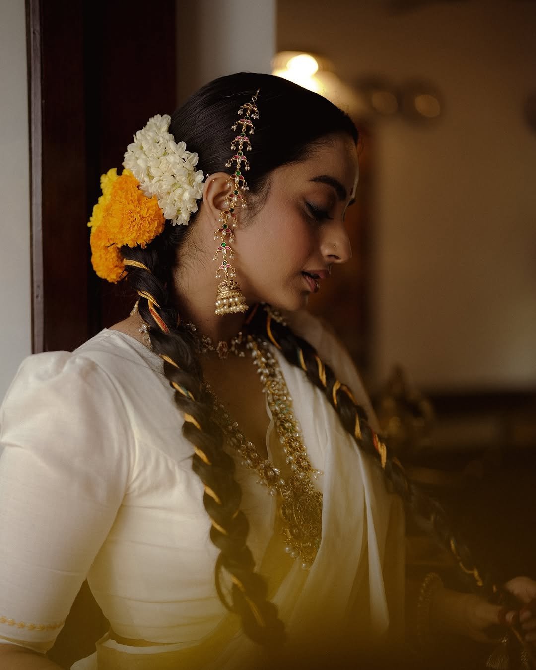 Namitha Pramod traditional braids jasmine gajra golden hour Photoshoot (5)