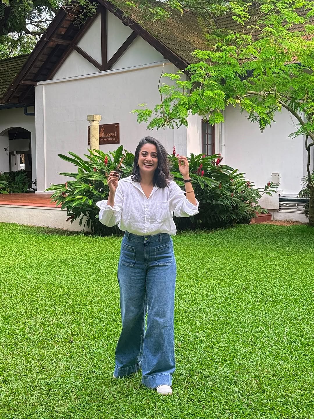 Namitha Pramod white linen shirt garden candid smile Portrait (2)