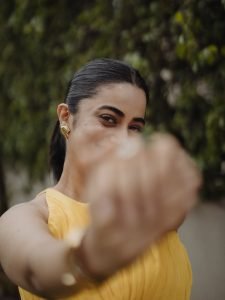 Joyful garden gaze from Namitha Pramod in sunny yellow dress