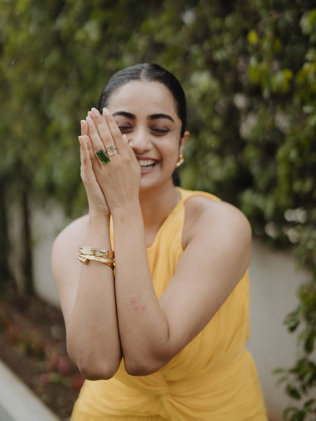 Namitha Pramod yellow twist dress garden gaze Photos (6)