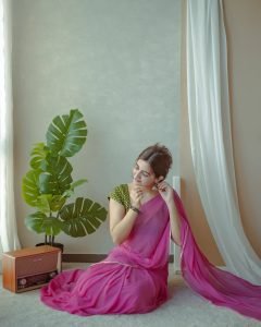 Neha Pathan charming smile in delicate pink chiffon saree