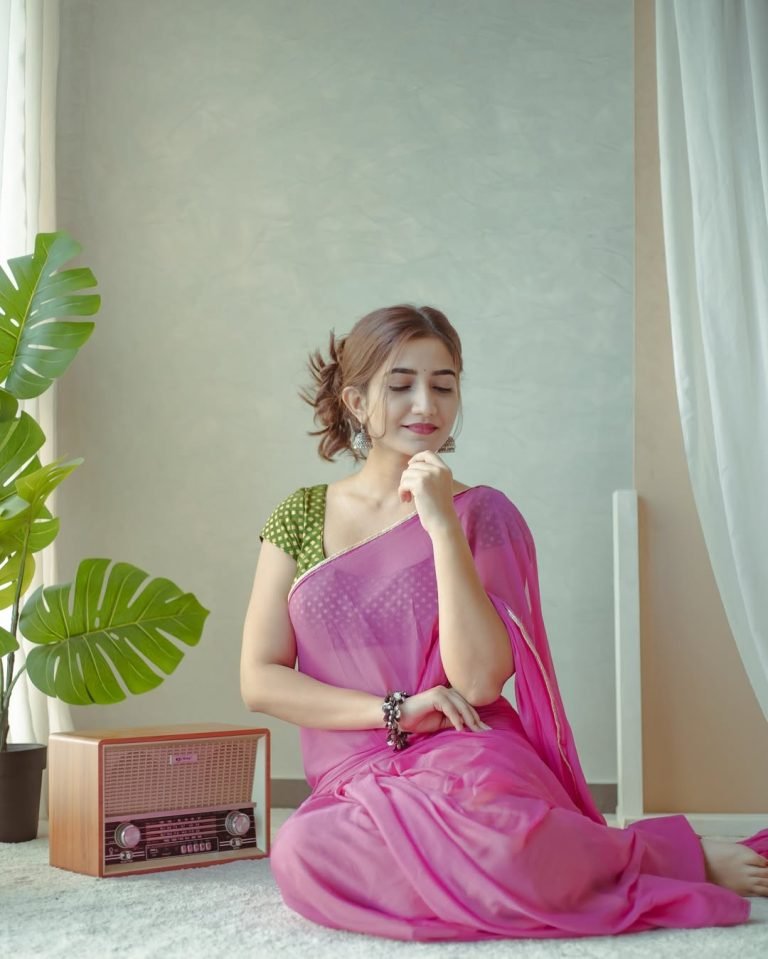 Soft pink fabric flowing in Neha Pathan comfortable indoor shoot