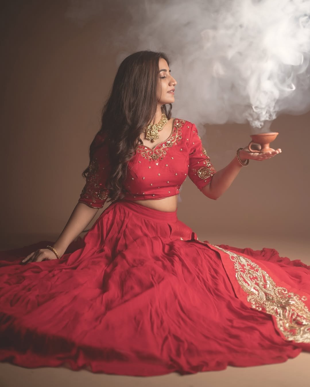 Neha Pathan red lehenga festive diya studio elegance Photoshoot (15)