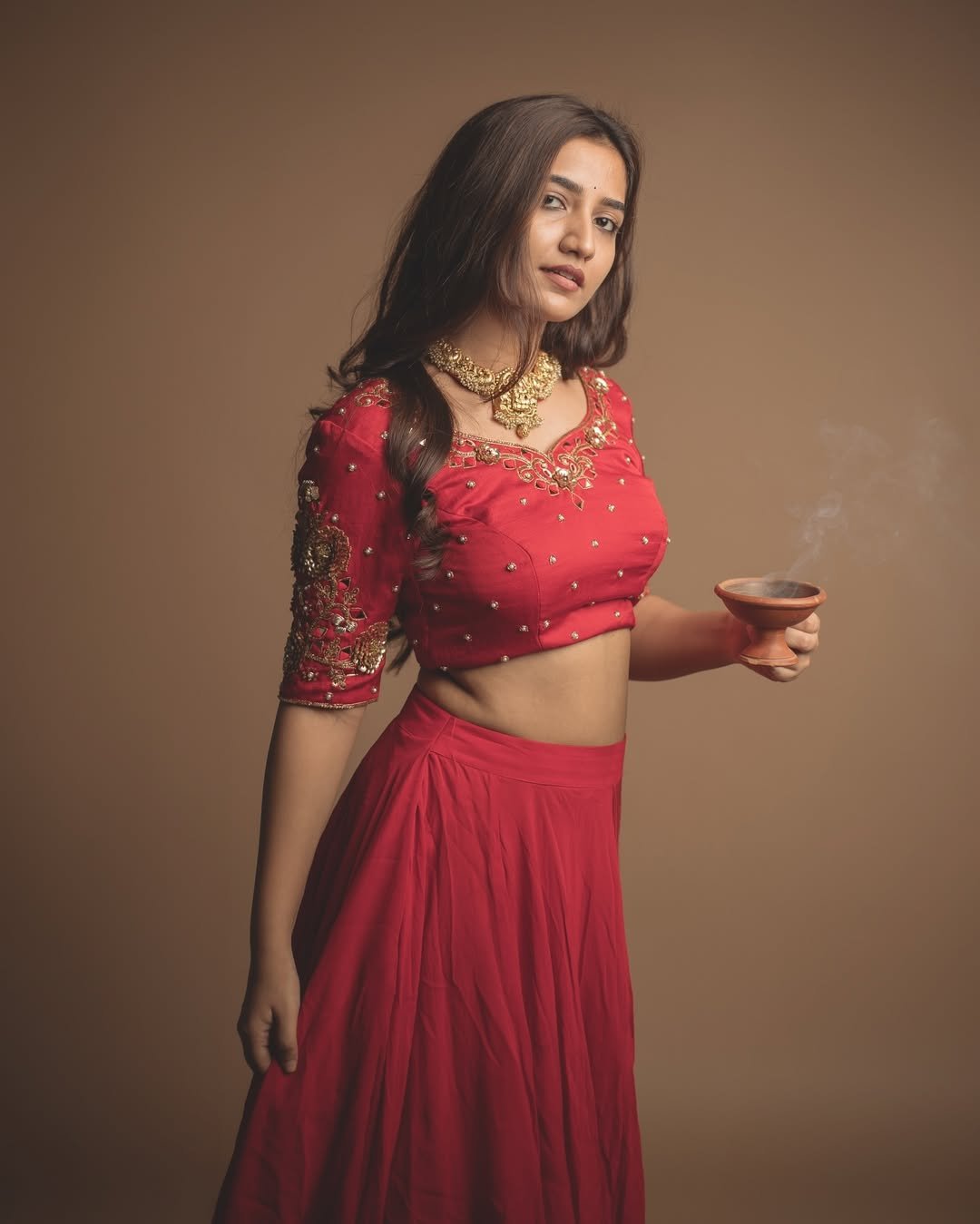Neha Pathan red lehenga festive diya studio elegance Photoshoot (17)