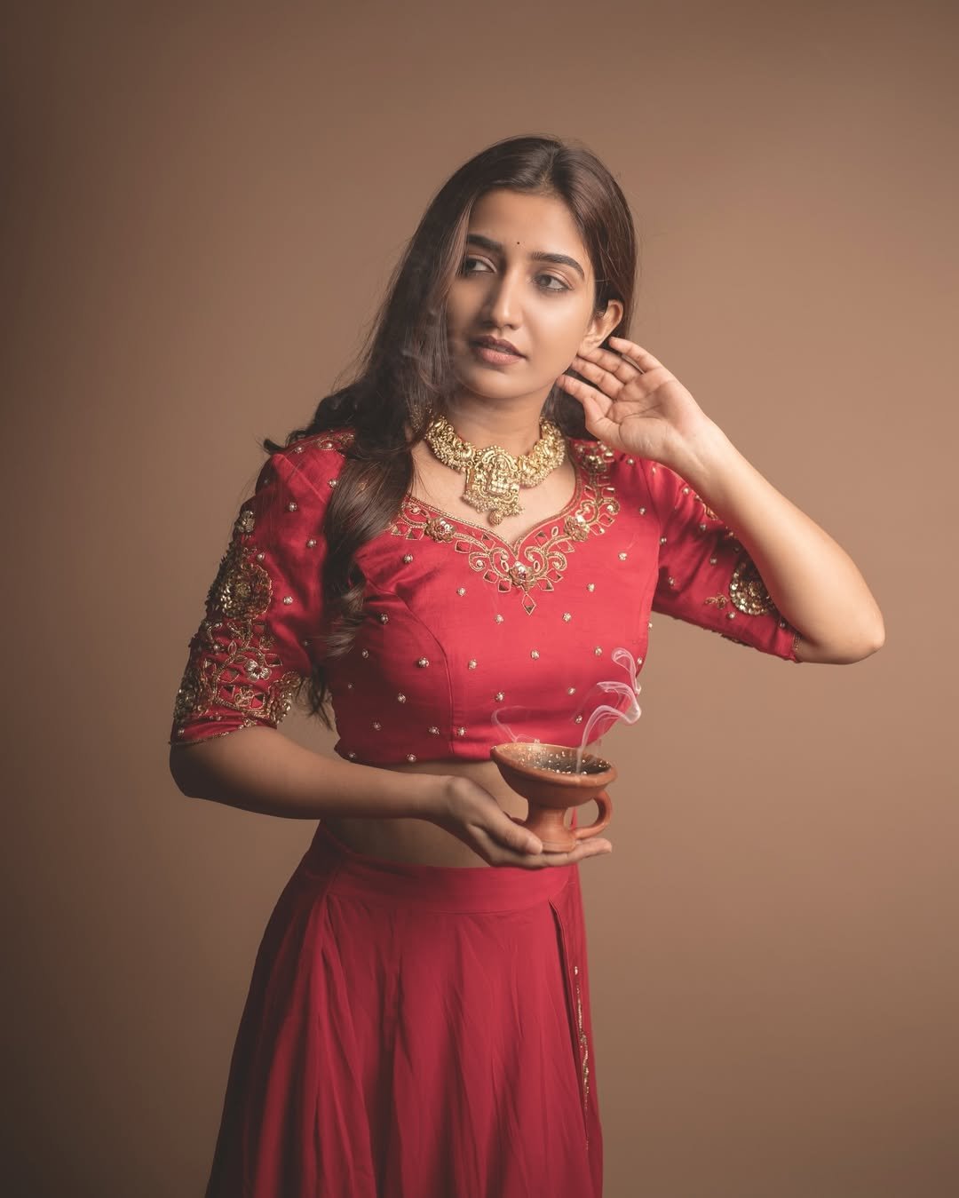 Neha Pathan red lehenga festive diya studio elegance Photoshoot (19)