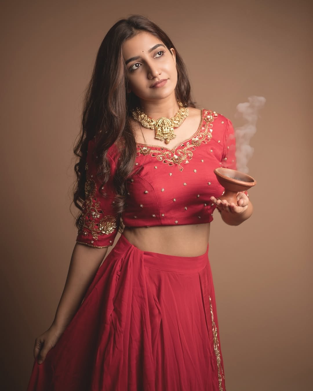 Neha Pathan red lehenga festive diya studio elegance Photoshoot (20)