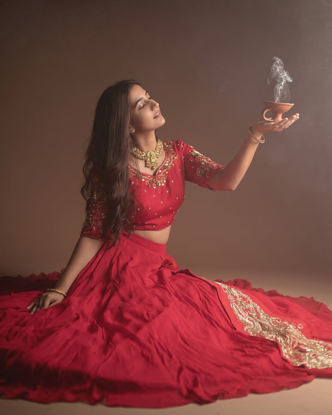Neha Pathan red lehenga festive diya studio elegance Photoshoot (6)