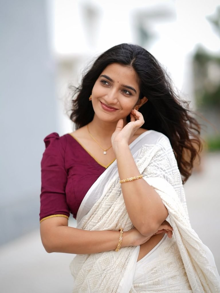 Neha Pathan cheerful expression in textured white saree outfit