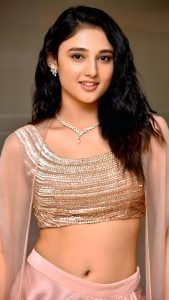 Ritika Nayak blush pink sequin blouse with soft pastel lehenga