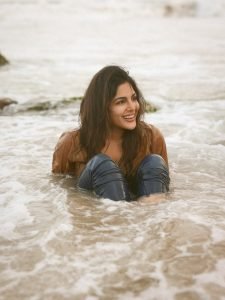 Coastal wind in hair as Samyuktha poses in neutral beige shirt