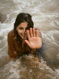 Samyuktha sand-beige shirt with ocean breeze beach portrait