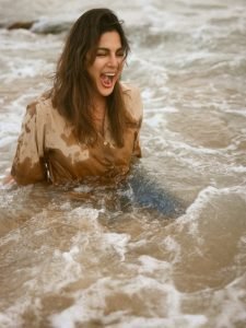 Coastal wind in hair as Samyuktha poses in neutral beige shirt