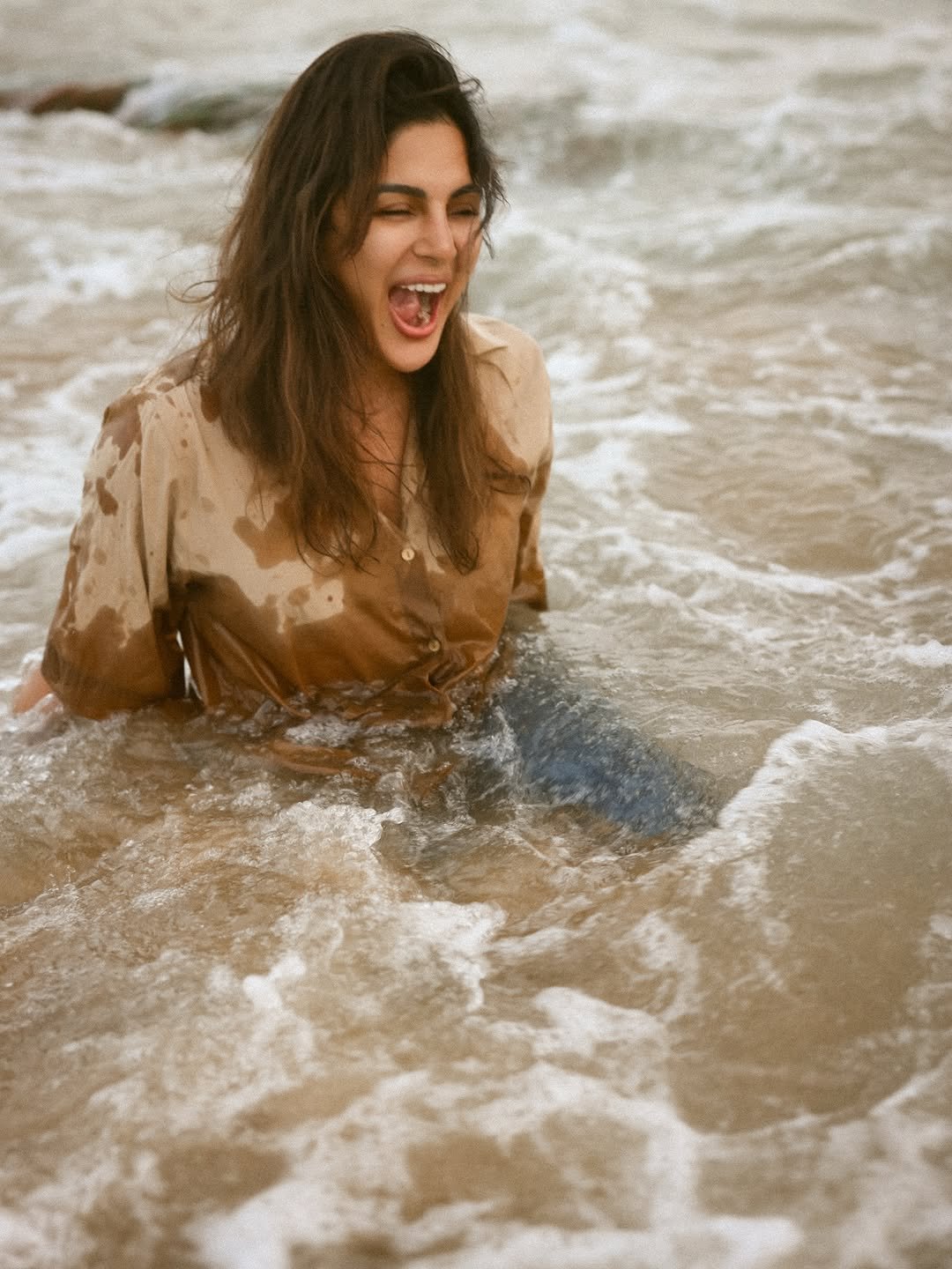 Samyuktha sand-beige shirt beach breeze Portrait (9)