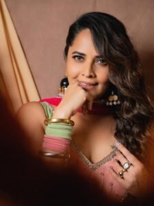 Anasuya Bharadwaj Smiles in Festive Floral Garland Look Photos (2)