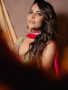 Anasuya Bharadwaj Smiles in Festive Floral Garland Look Photos (4)