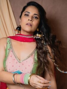 Anasuya Bharadwaj Smiles in Festive Floral Garland Look Photos (7)