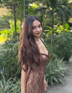 Anushka Sen brown lace slip dress botanical photo