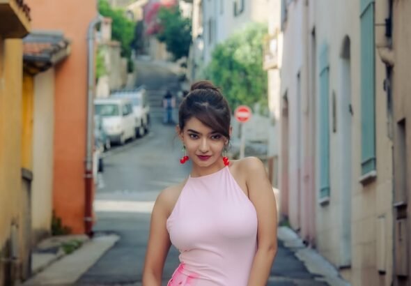 Anushka Sen cute pink halter dress statement earrings