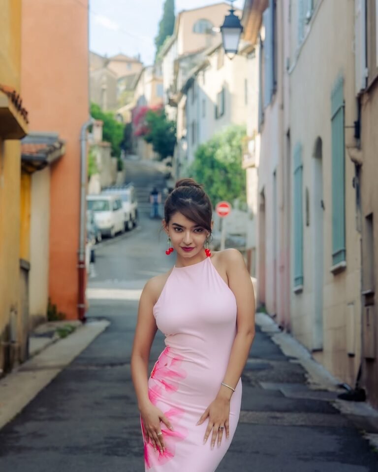 Anushka Sen cute pink halter dress statement earrings