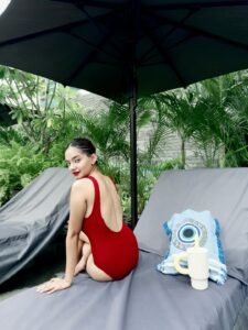 Anushka Sen glamorous red swimsuit poolside wear