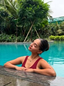 Anushka Sen red swimsuit poolside mermaid vibes