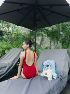 Anushka Sen glamorous red swimsuit poolside wear