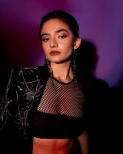 Anushka Sen Statement Glam Embellished Jacket and Fishnet Crop Top (7)