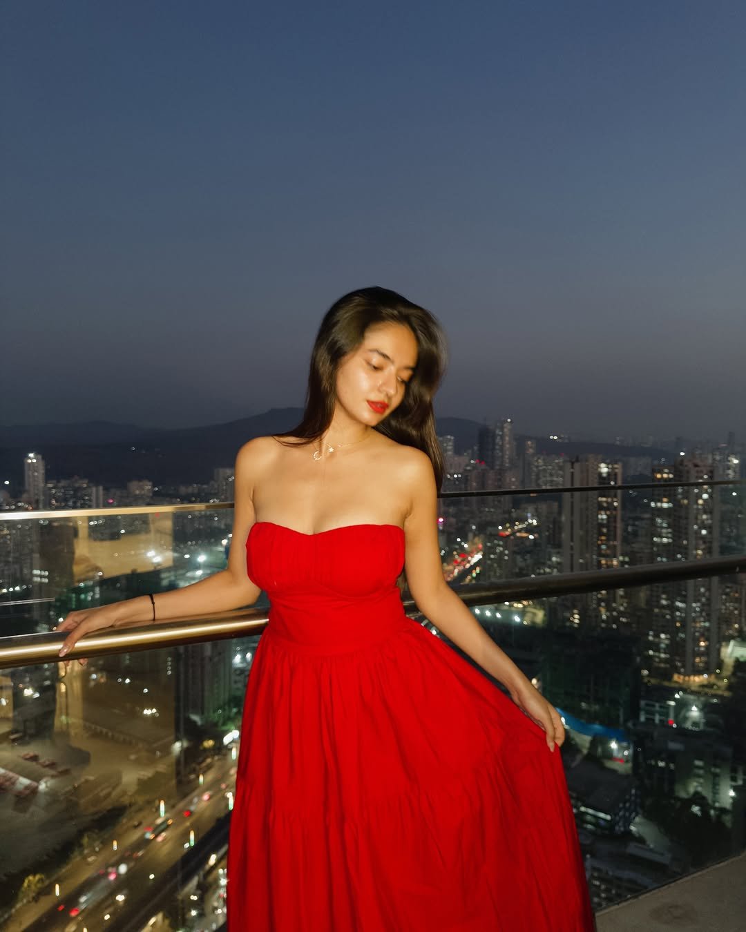 Anushka Sen Striking Red Strapless Dress – Rooftop Night Glam (60)