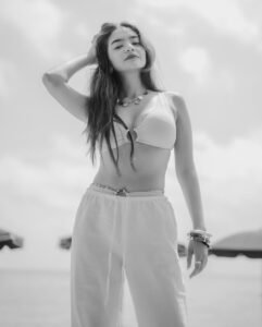 Anushka Sen blue top white pants balcony summer