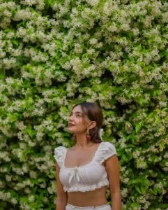 Anushka Sen white ruffle co-ord beachside summer photo