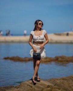 Anushka Sen white ruffle co-ord beachside summer photo