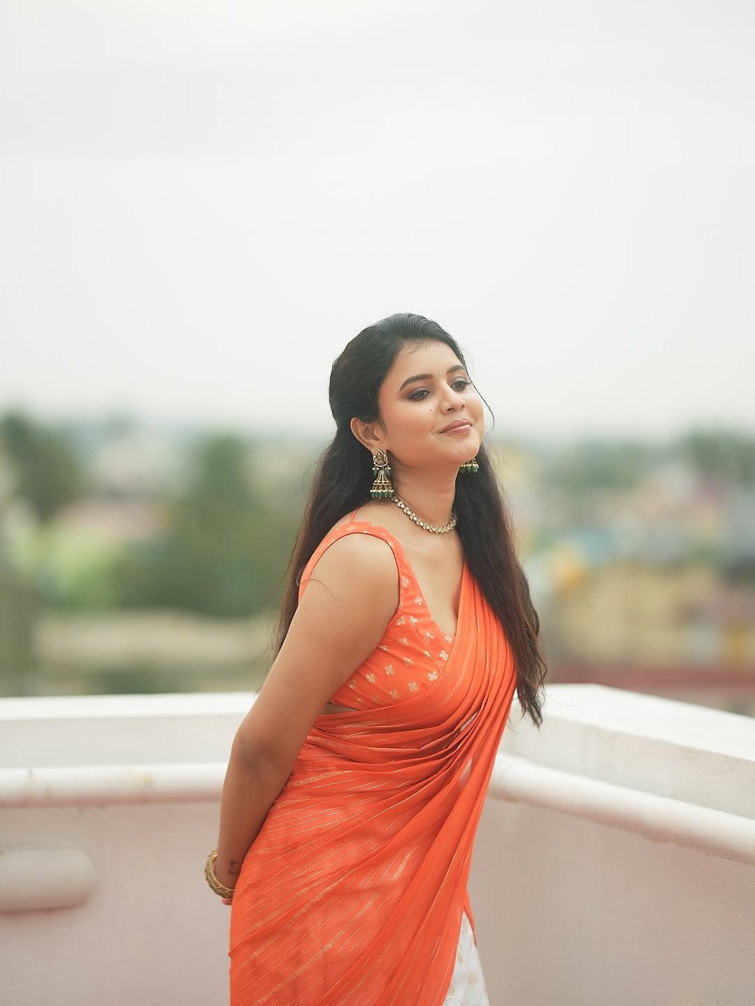 Arul Jyothi Beautiful in Vibrant Orange Saree with Traditional Jewelry (10)