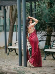 Delna Davis Elegant Maroon Saree Outdoor Photoshoot (12)