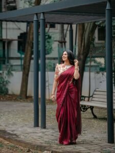 Delna Davis Elegant Maroon Saree Outdoor Photoshoot (15)