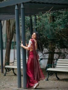 Delna Davis Elegant Maroon Saree Outdoor Photoshoot (19)