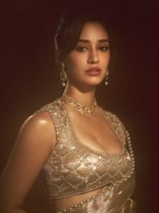 Disha Patani elegant gold saree wedding wear