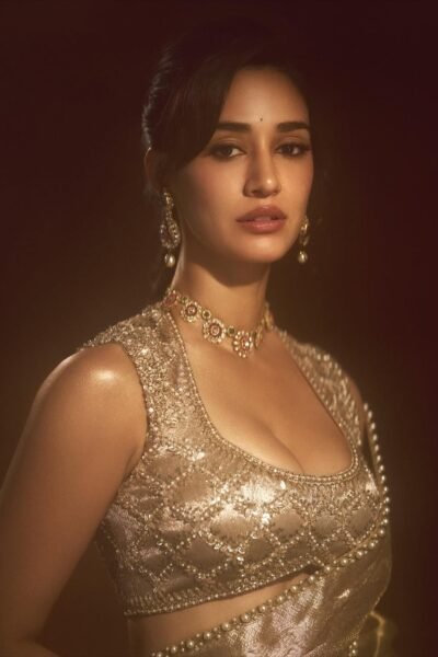 Disha Patani elegant gold saree wedding wear