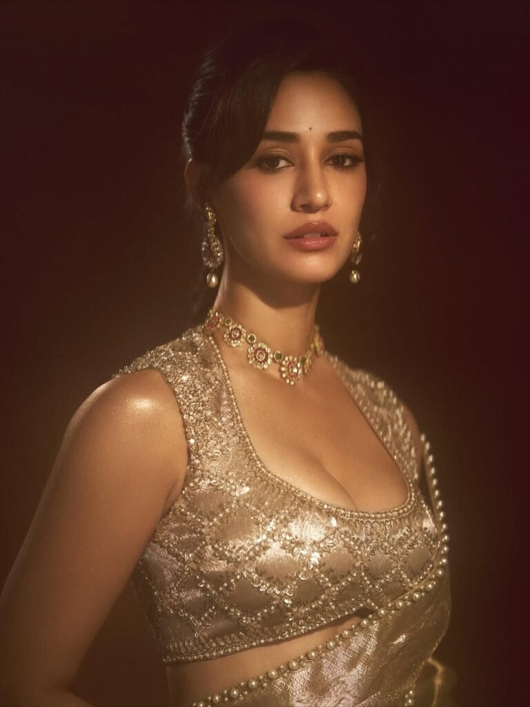 Disha Patani elegant gold saree wedding wear