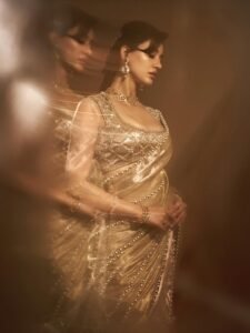 Disha Patani elegant gold saree wedding wear