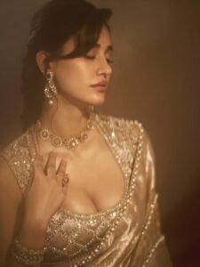 Indian actress Disha Patani luxurious gold bridal saree