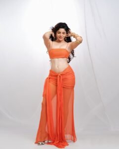 Divya Bharathi Dazzles in Orange Western Crop Top and Skirt Photos (5)