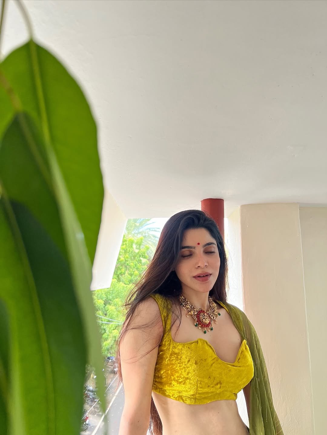 Divya Bharathi Stuns in Olive Green Saree and Yellow Blouse Photos (10)