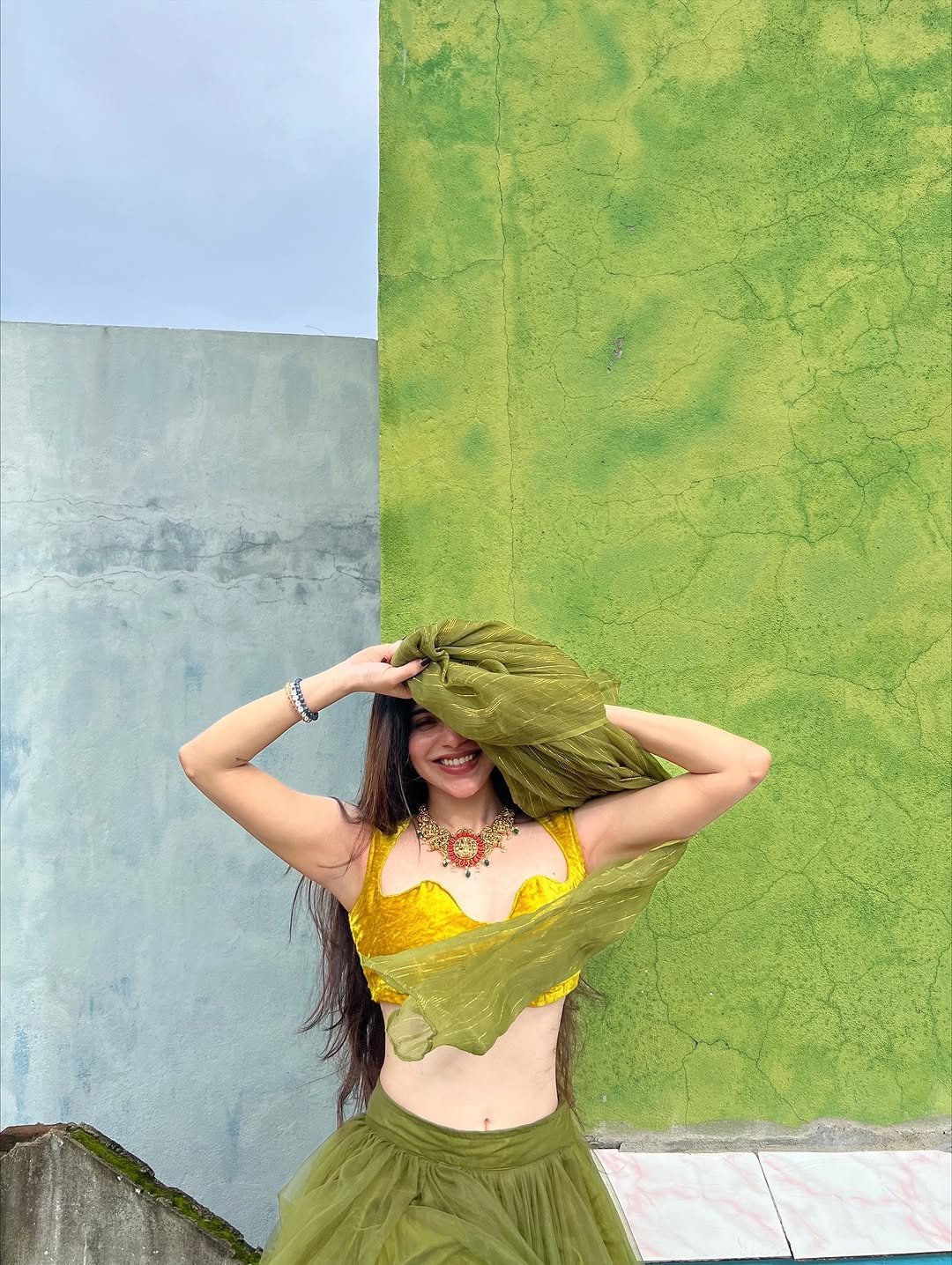 Divya Bharathi Stuns in Olive Green Saree and Yellow Blouse Photos (13)