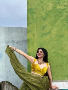 Divya Bharathi Stuns in Olive Green Saree and Yellow Blouse Photos (18)